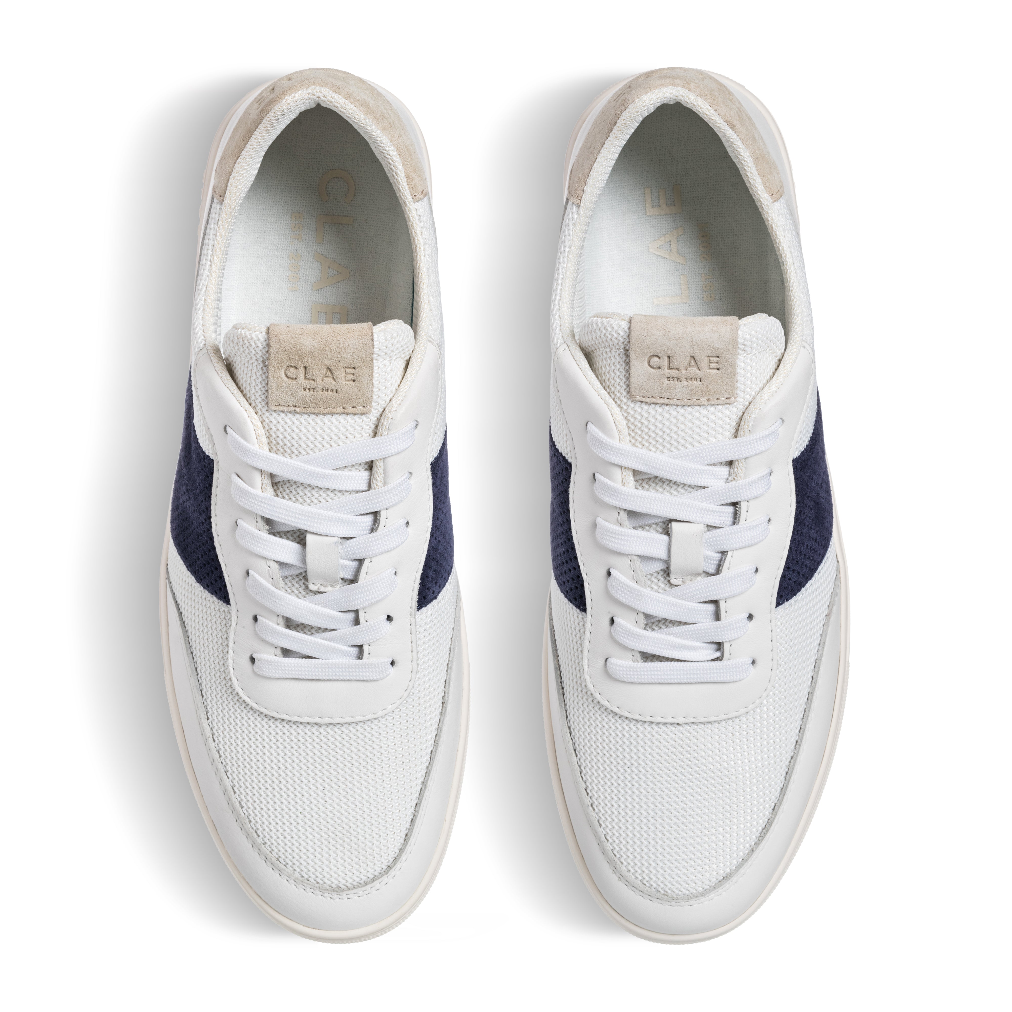 Three-quarter view of Davis court shoe in White Navy Wood Ash, highlighting elegant design and durable construction.