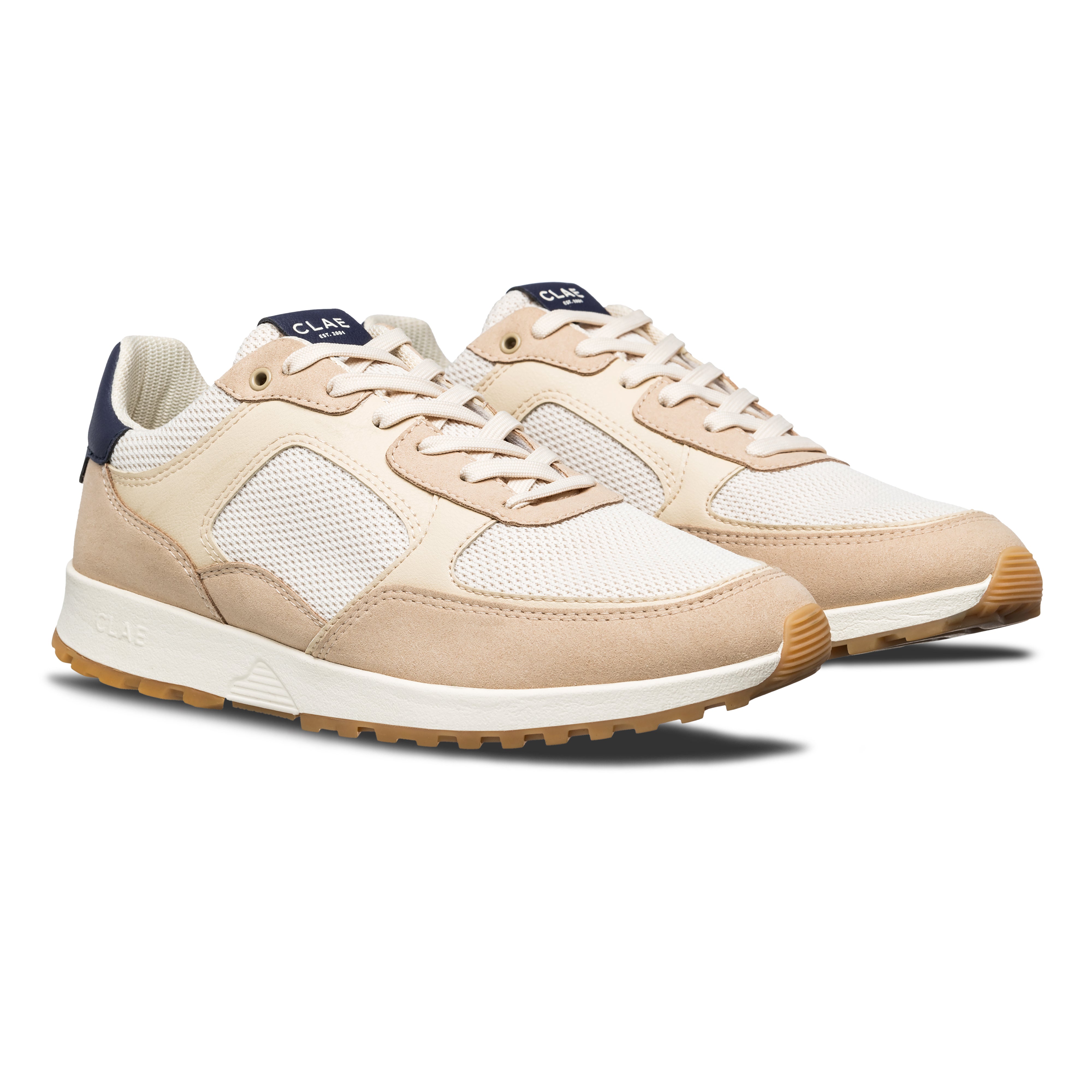 Three-quarter view of Joshua trainer in Safari Off-White, highlighting sustainable materials and modern trainer design.