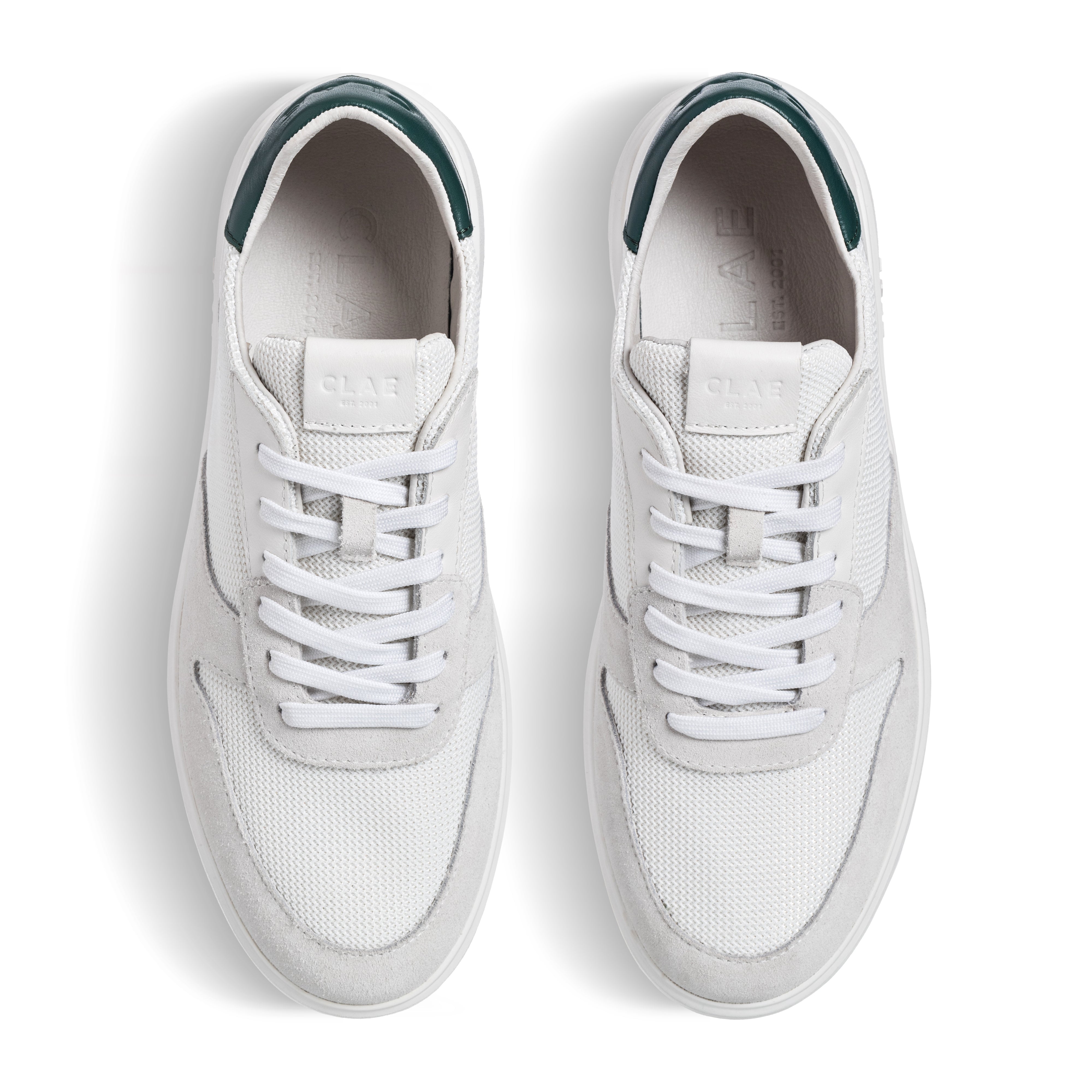 Top view of Moses sneaker in White Pine Needle, showing Italian leather, suede, and recycled mesh upper with sleek court-style design.