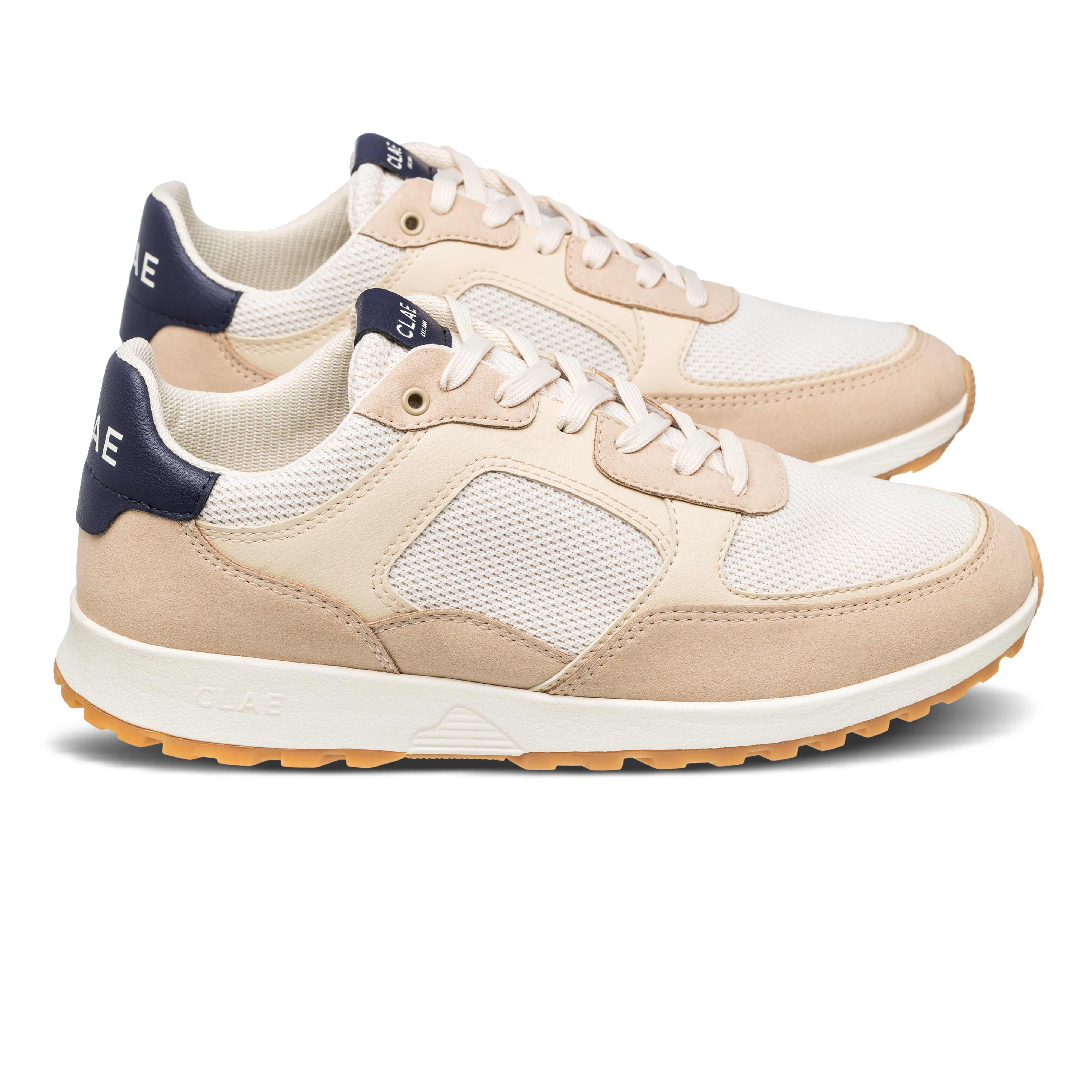 Joshua trainer in Safari Off-White, 100% vegan with recycled materials, side view showing sleek silhouette and subtle detailing.