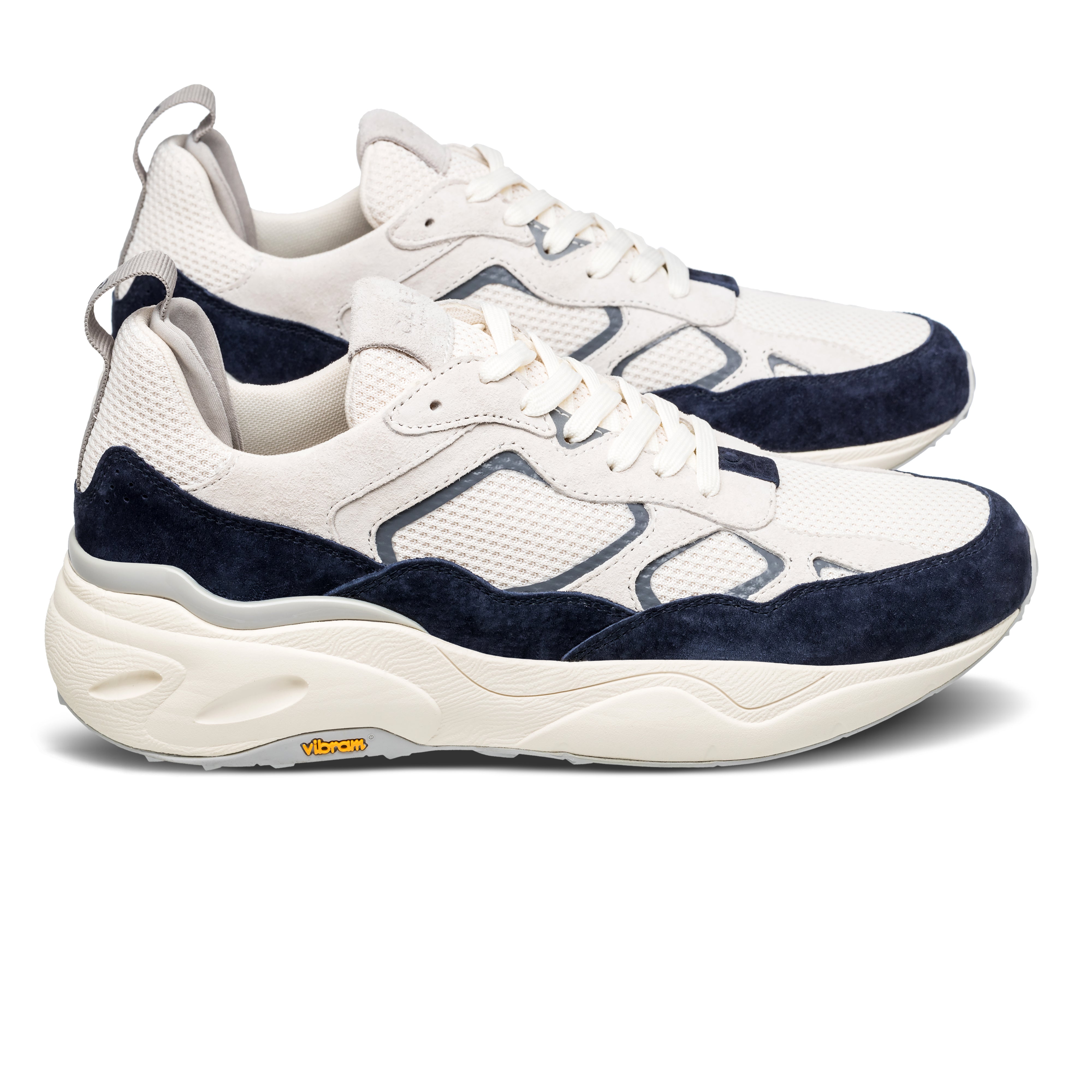 Salazar runner in Off-White Navy with suede and recycled mesh upper, side view showing premium lifestyle runner silhouette.